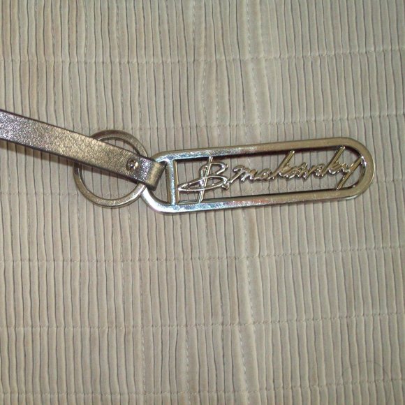 B. MAKOWSKY NICKEL CUTOUT ON SILVER LEATHER LOOP STRAP KEY FOB CHARM KEYCHAIN - Picture 1 of 5